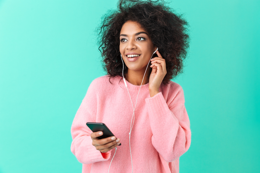 Woman with earbuds