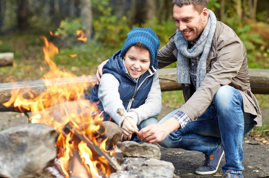 Father and Son Roasting Marshmallows