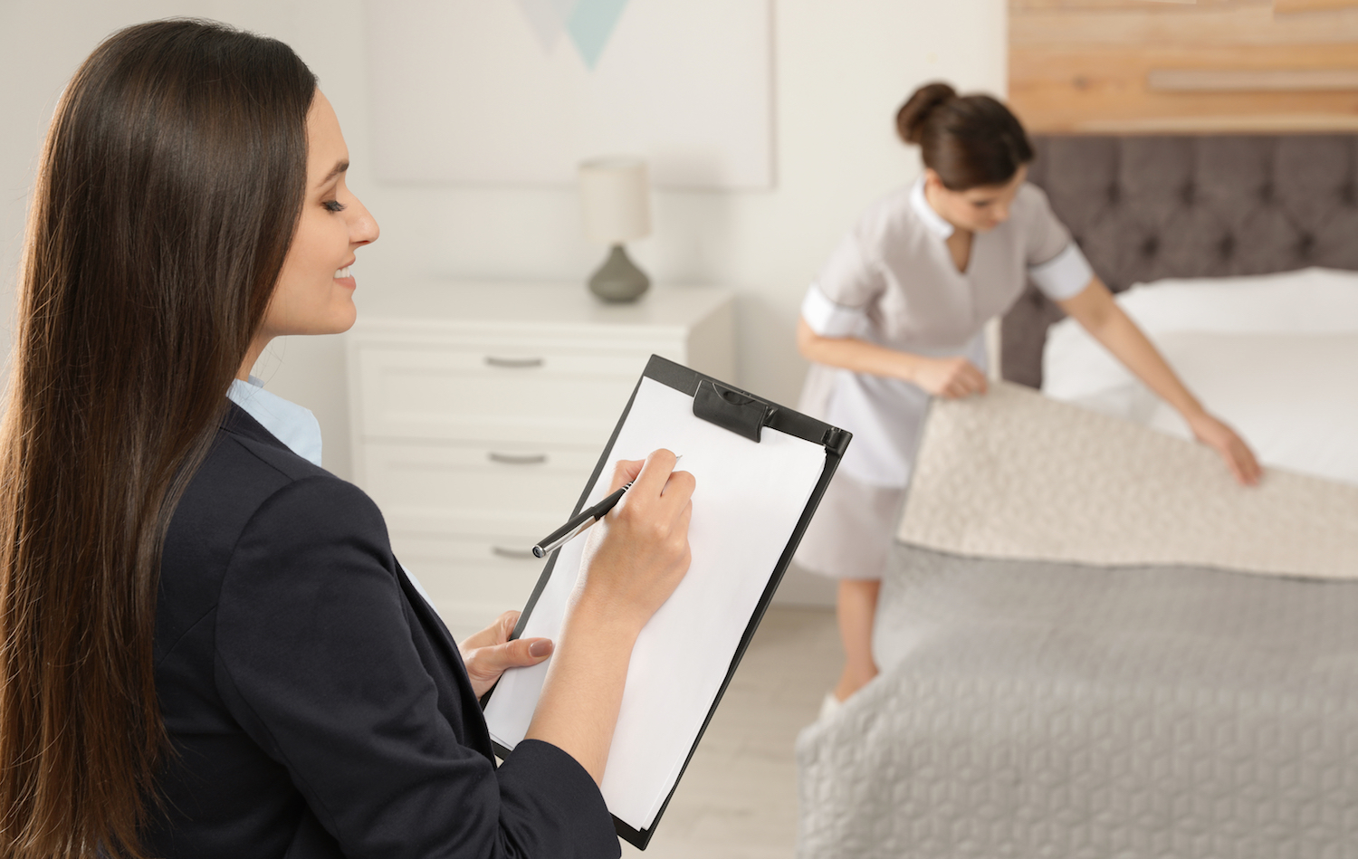 Housekeeping Manager Checking Hotel Room