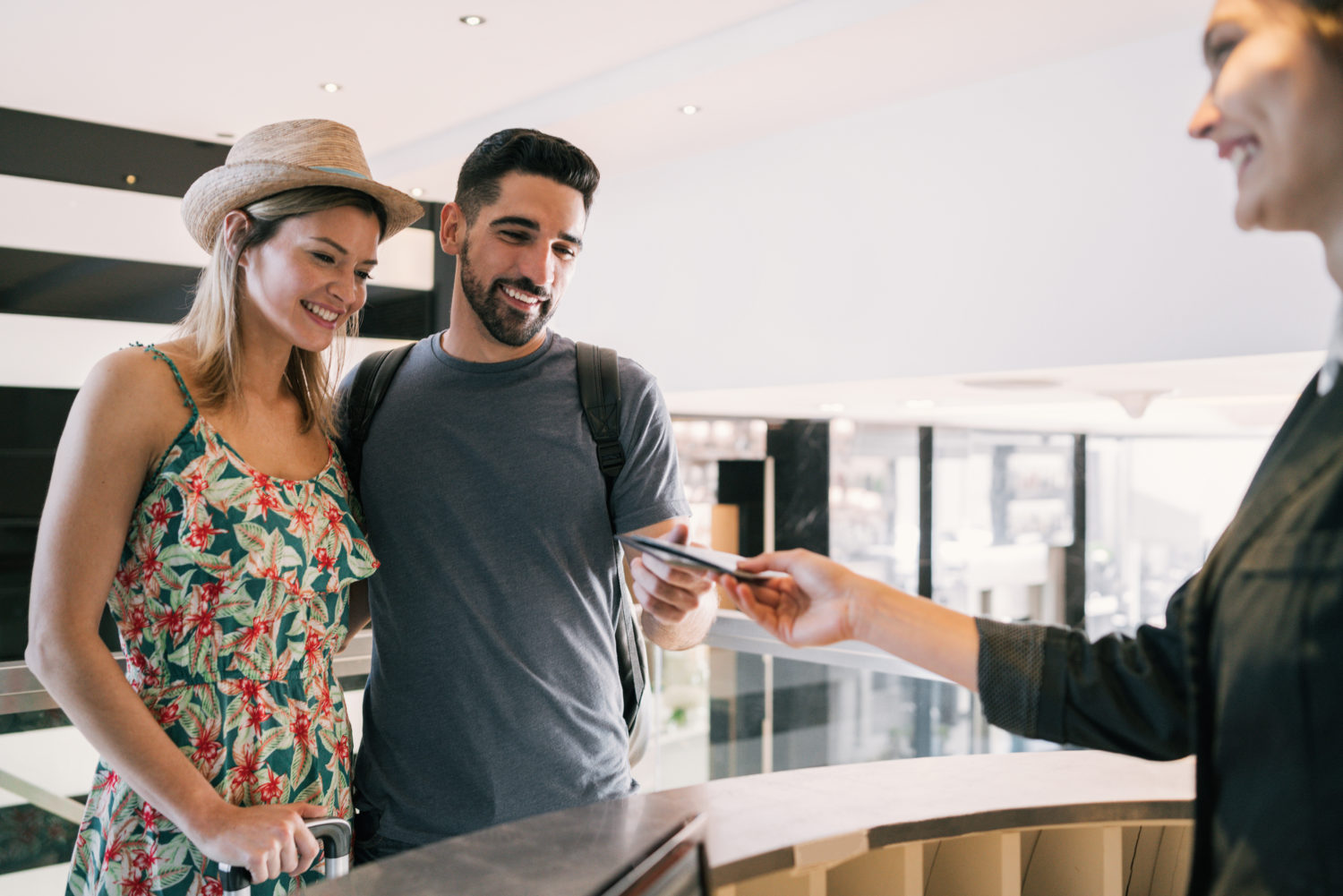 Couple checking in at hotel