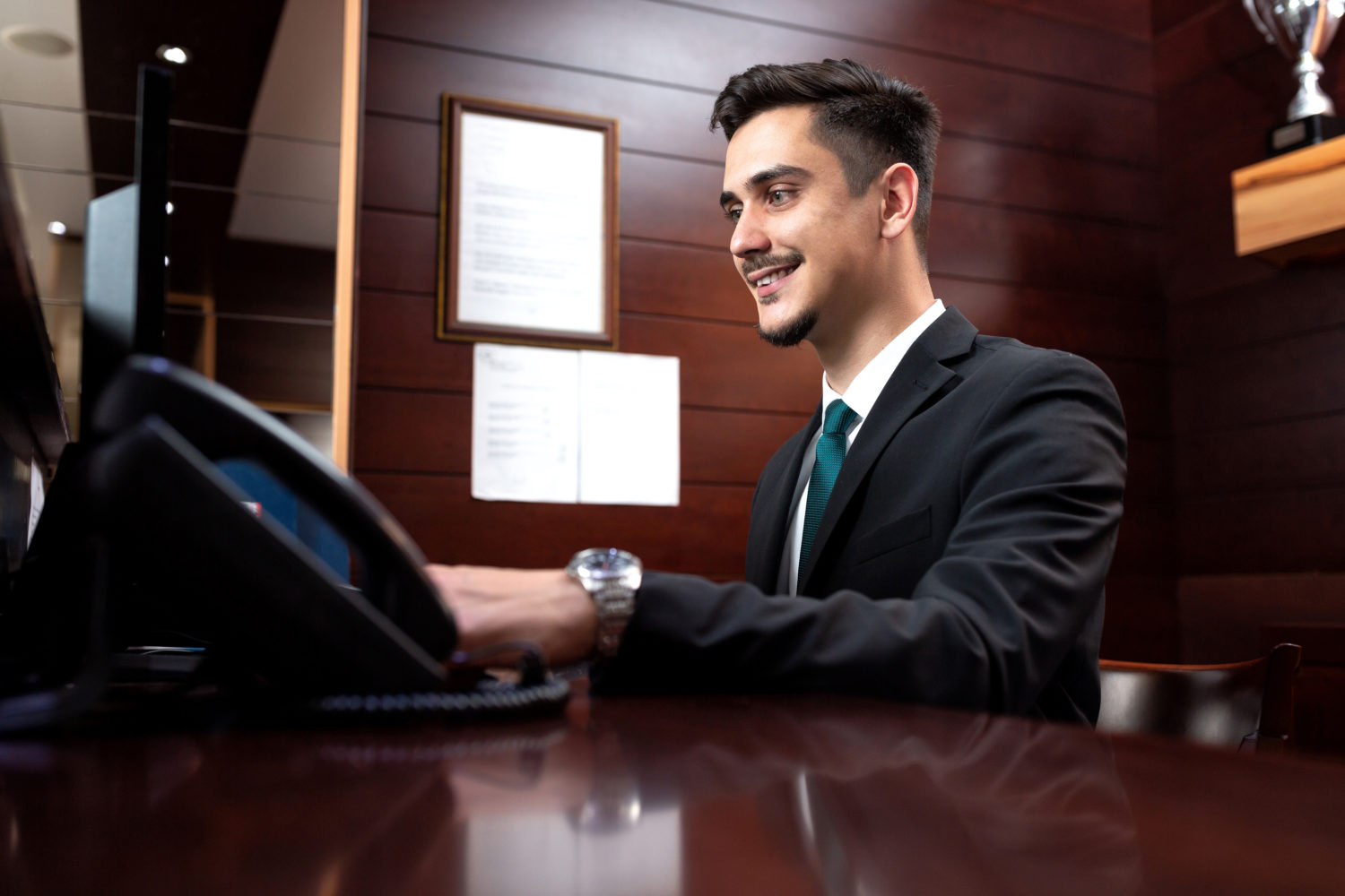 Receptionist working at the front desk