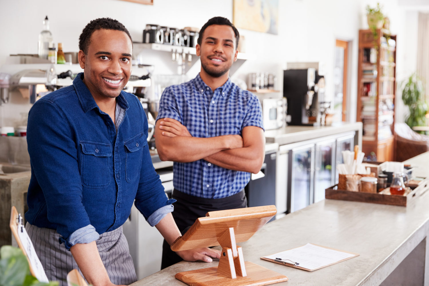 Local restaurant owners behind a counter