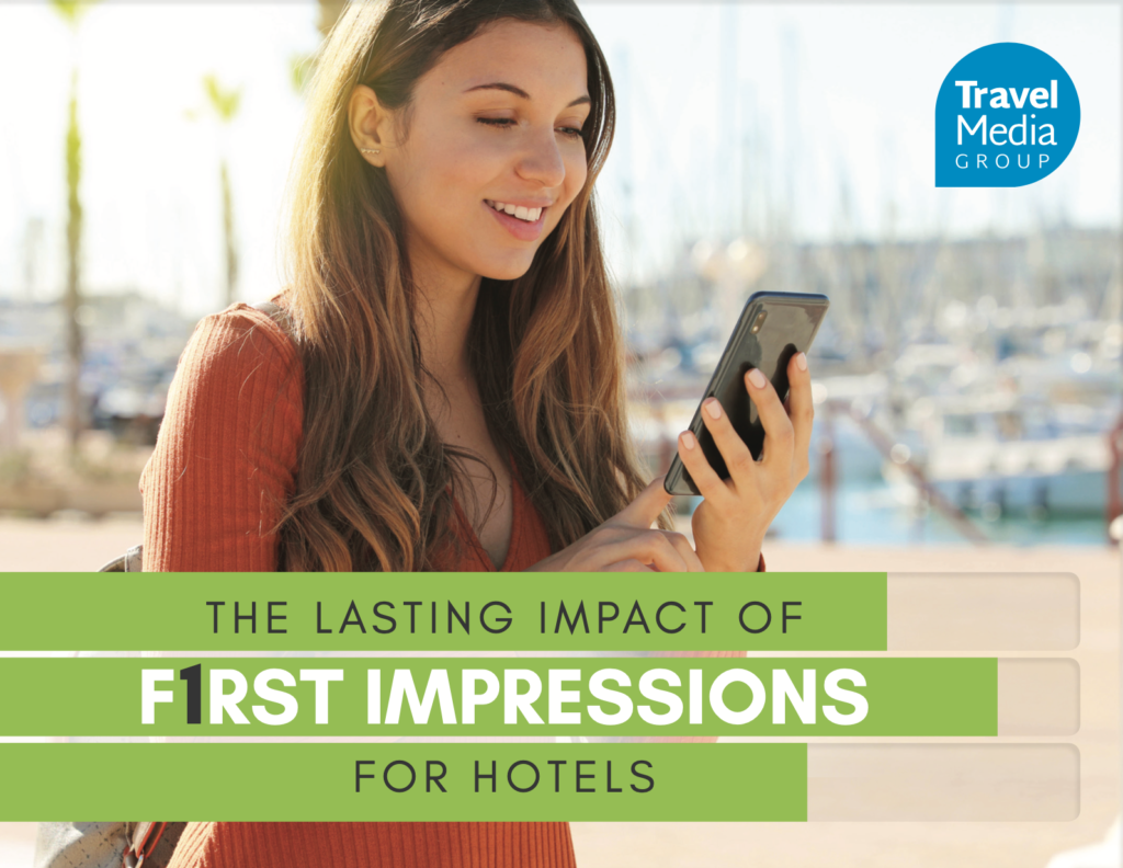 Girl smiling at her phone with text overlay reading The Lasting Impact of 1st Impressions for Hotels