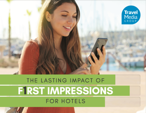 Girl smiling at her phone with text overlay reading The Lasting Impact of 1st Impressions for Hotels