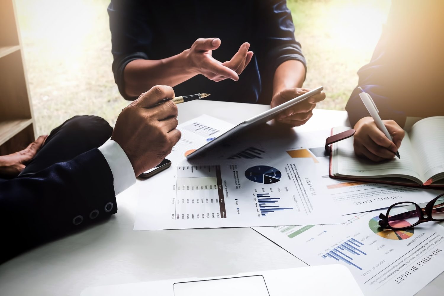 Group of business members discussing data