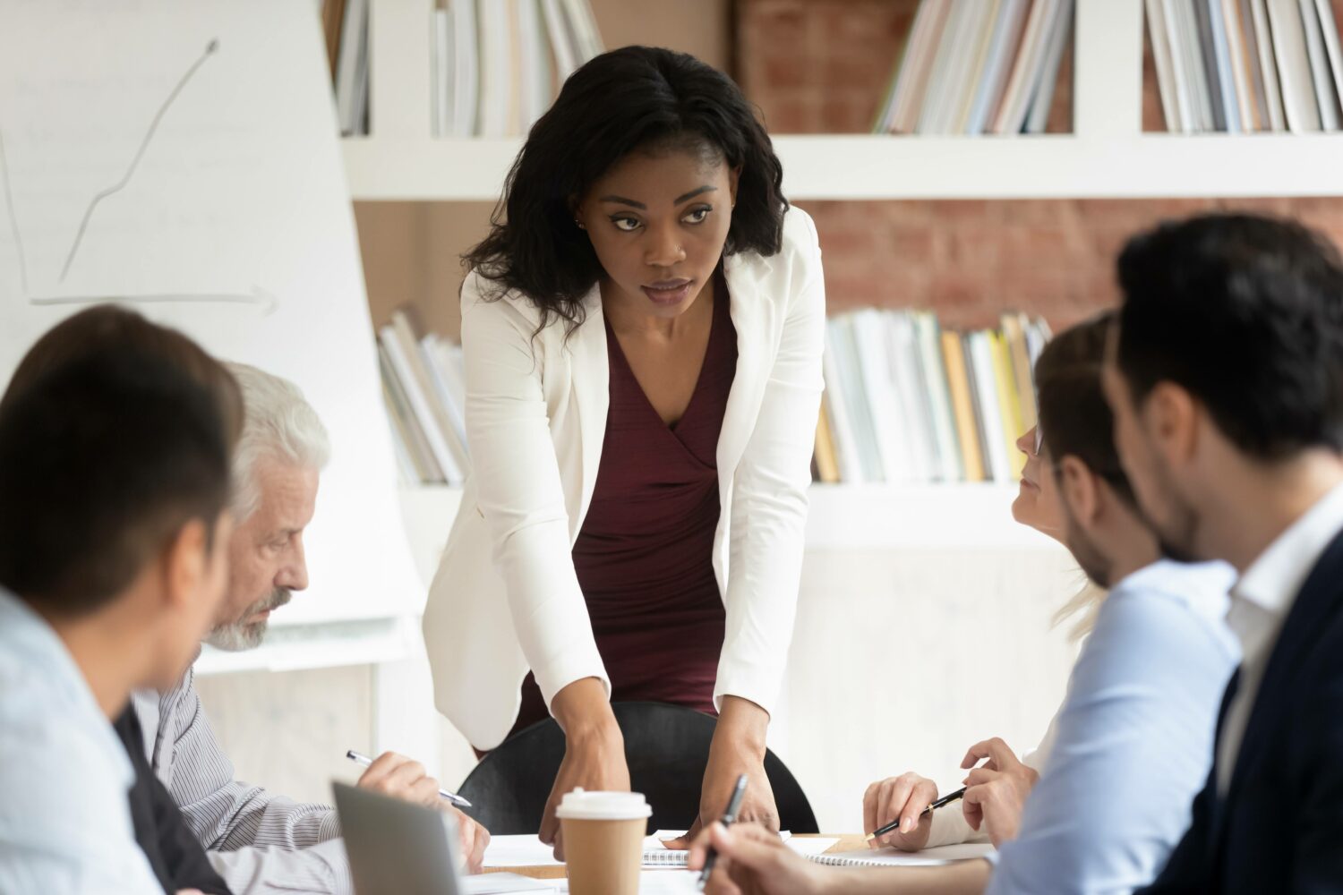 black businesswoman leading a team meeting